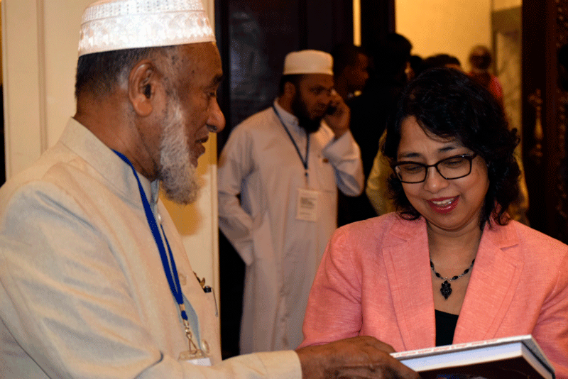 Religions for Peace Deputy Secretary General Deepika Singh speaks with Asheikh Athambawa, Principal at Taibah Arabic College.