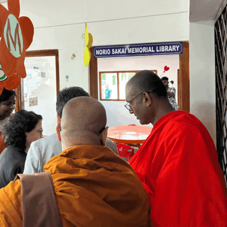 participants at the preschool's new library