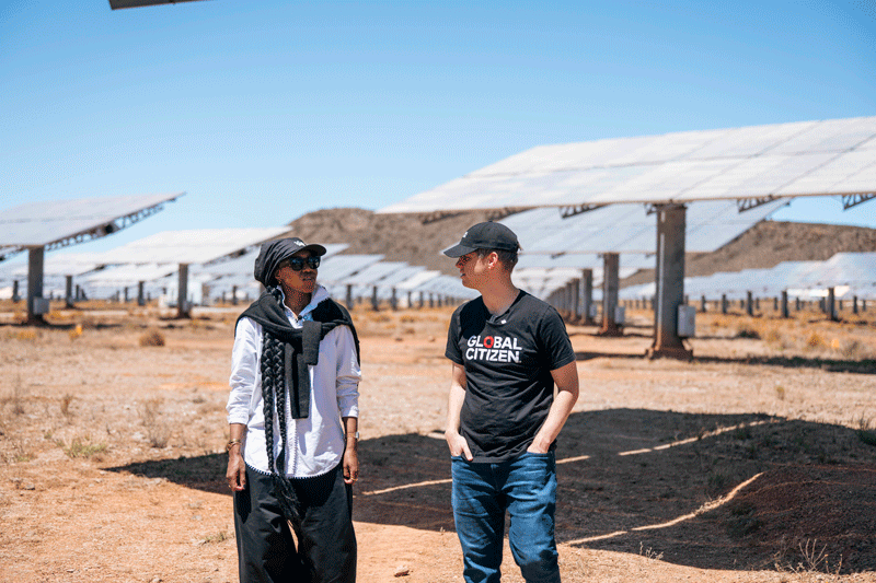 Michael Sheldrick and Fumani Mthembi at a major solar power installation in the Western Cape region of South Africa.